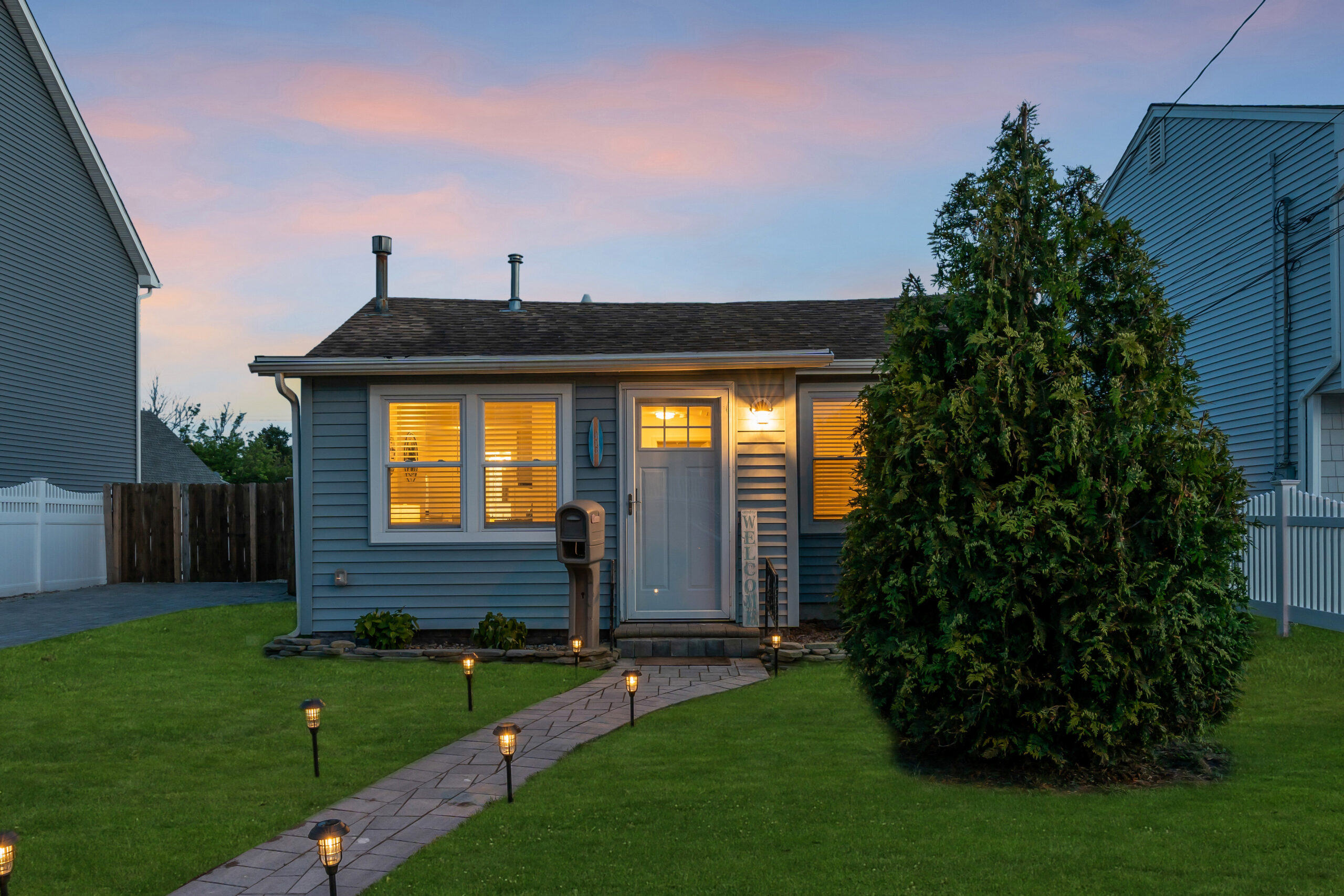 The Belmar Family Compound vacation rental exterior at twilight - Belmar, NJ