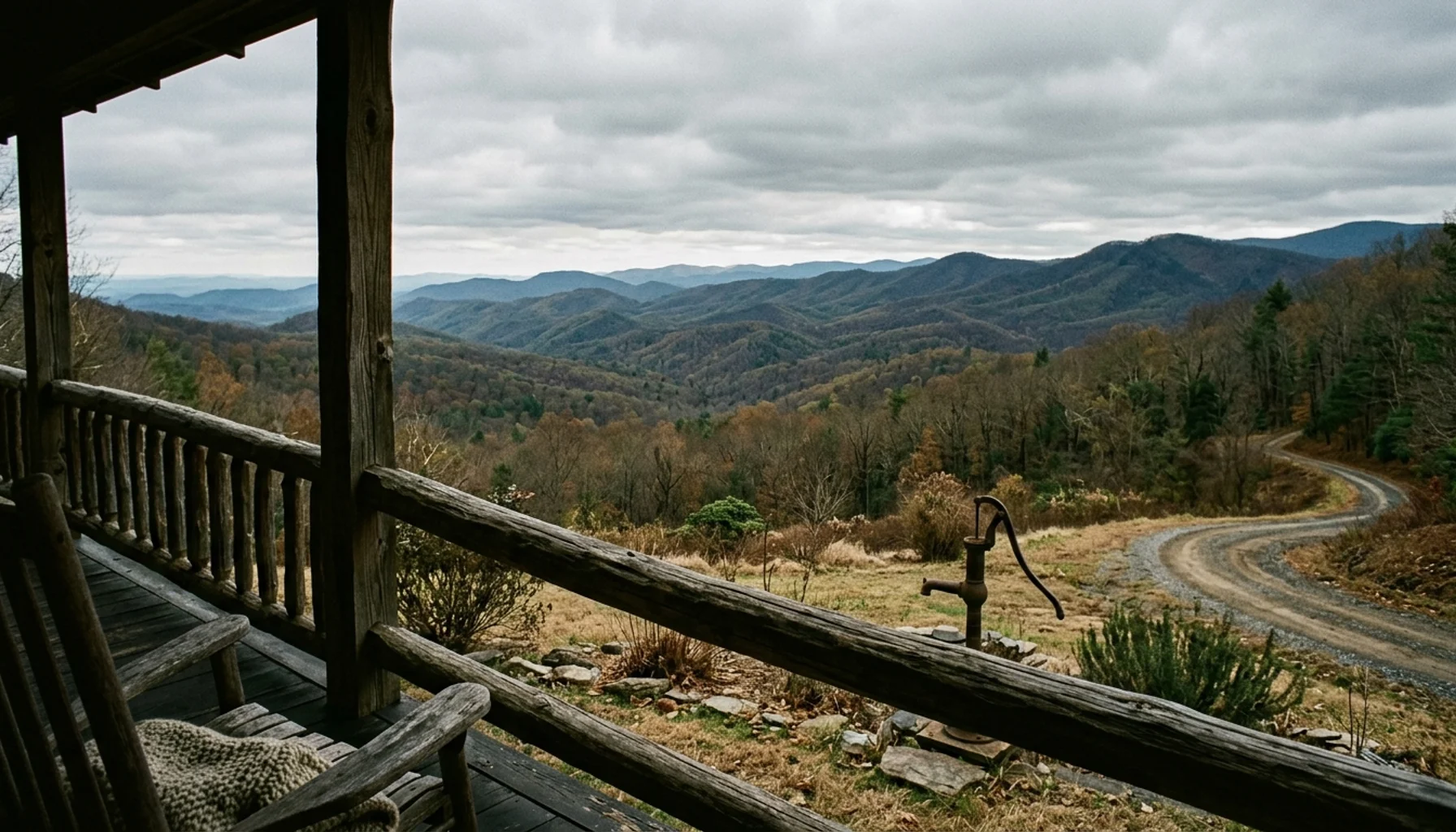 Rural Shenandoah Valley VA cabin porch overlooking wooded ridgelines, representing airbnb management challenges near Luray and Stanley