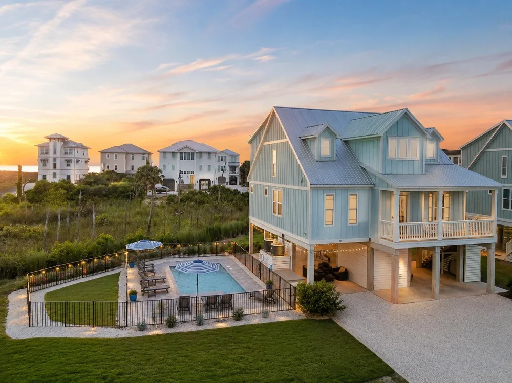 Aerial view of a 2026 client home and its pool, Cape San Blas, FL