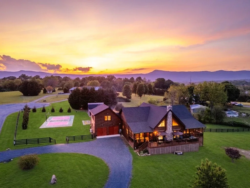 A client home at sunset with the Blue Ridge Mountains behind it, Luray, VA