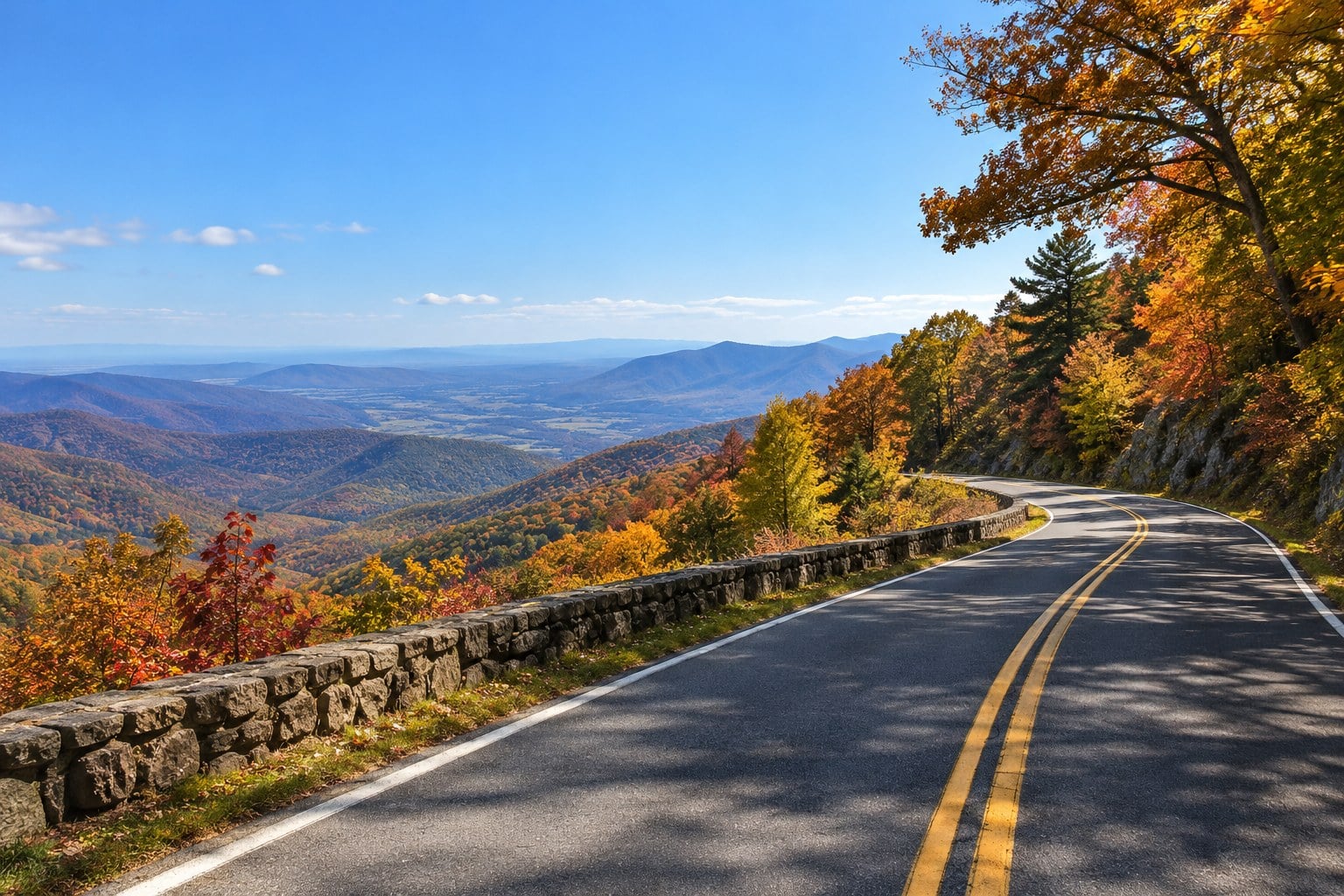 Skyline Drive curving through peak fall color
