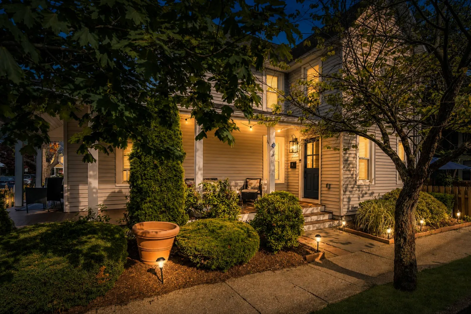 The Embury Hideaway, a Victorian apartment in Ocean Grove, NJ, at night