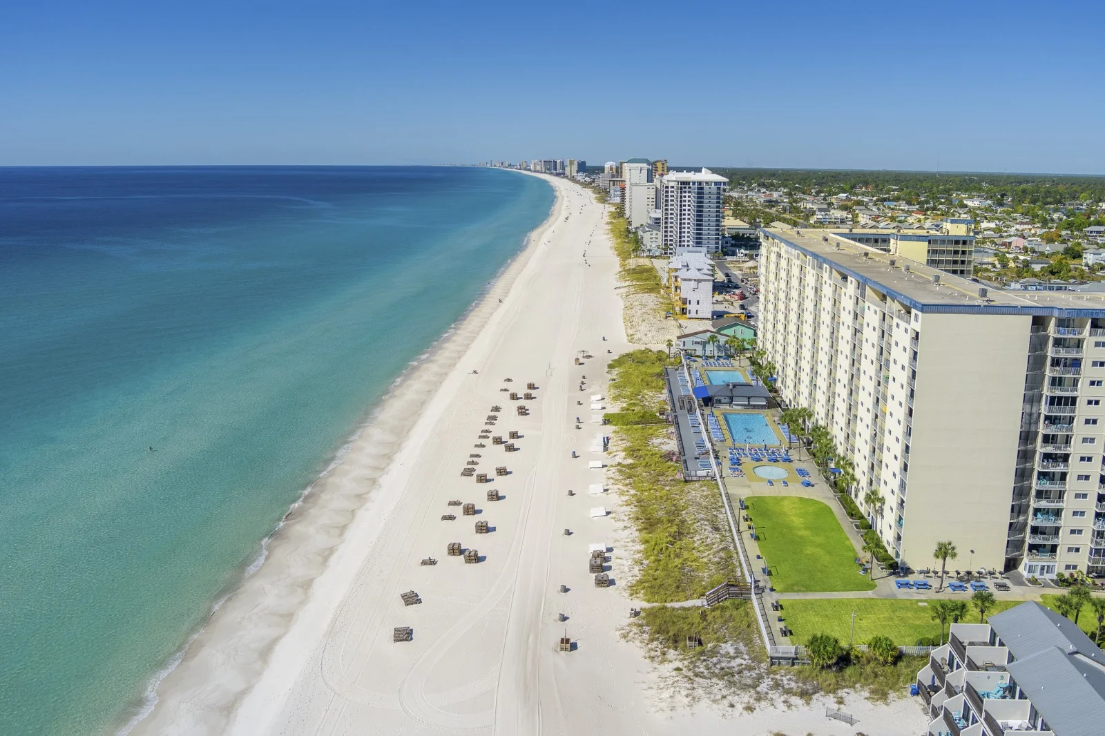 Beachfront condo rentals in PCB FL with pools and white sand beach views