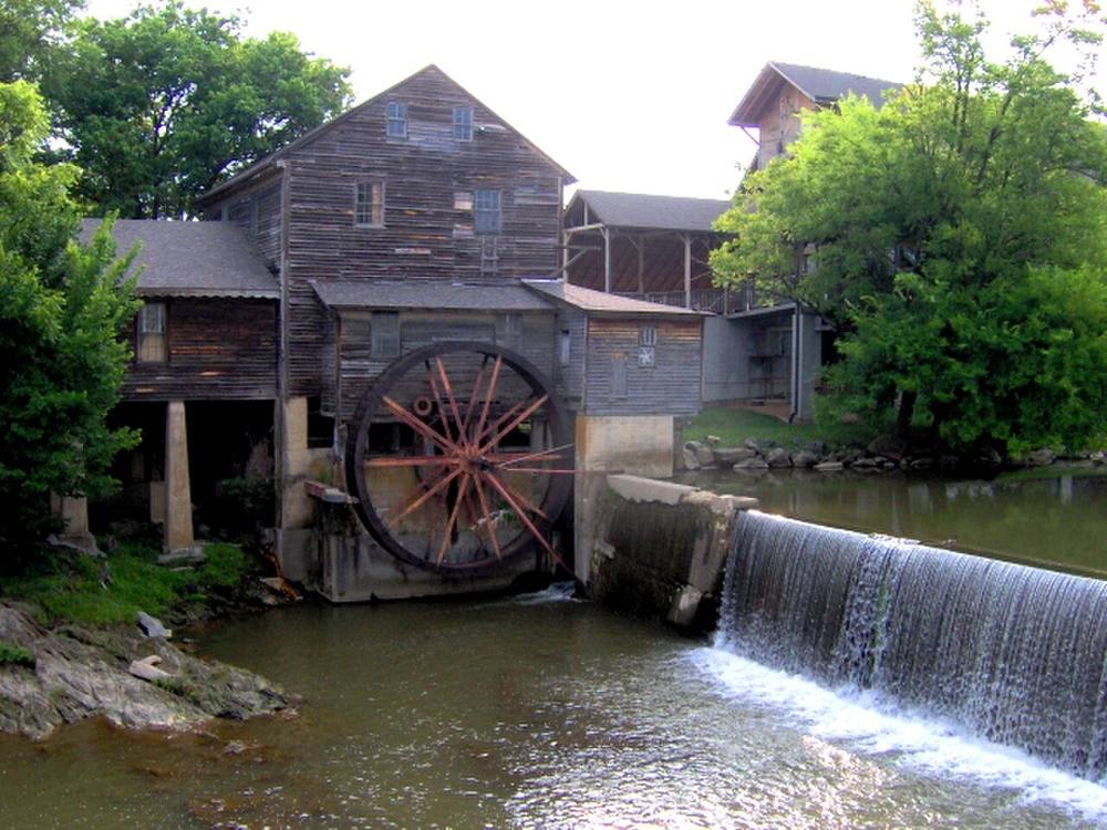 The 1830s Old Mill turning on the Little Pigeon River in Pigeon Forge